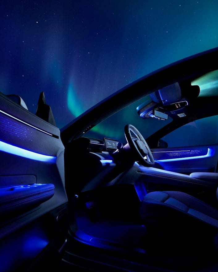 Interior illumination in Polestar 4 with Northern Lights backdrop.