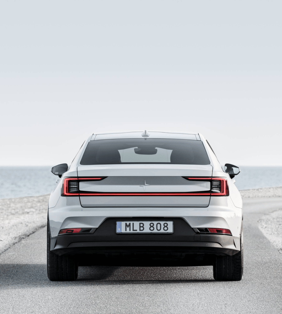 Rear view of the back of the Polestar 2 on a road outside