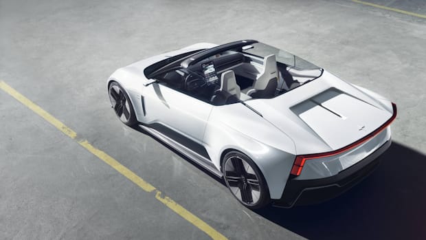The electric roadster concept top off on a concreat road.