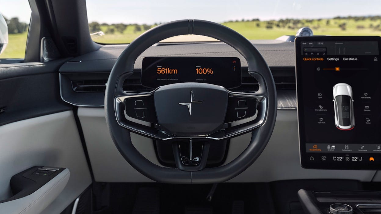 Interior of a Polestar 3 showing the steering wheel and display