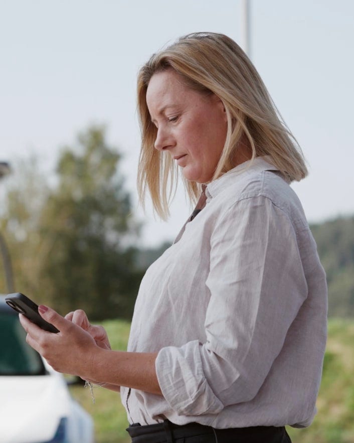 Woman holding smartphone