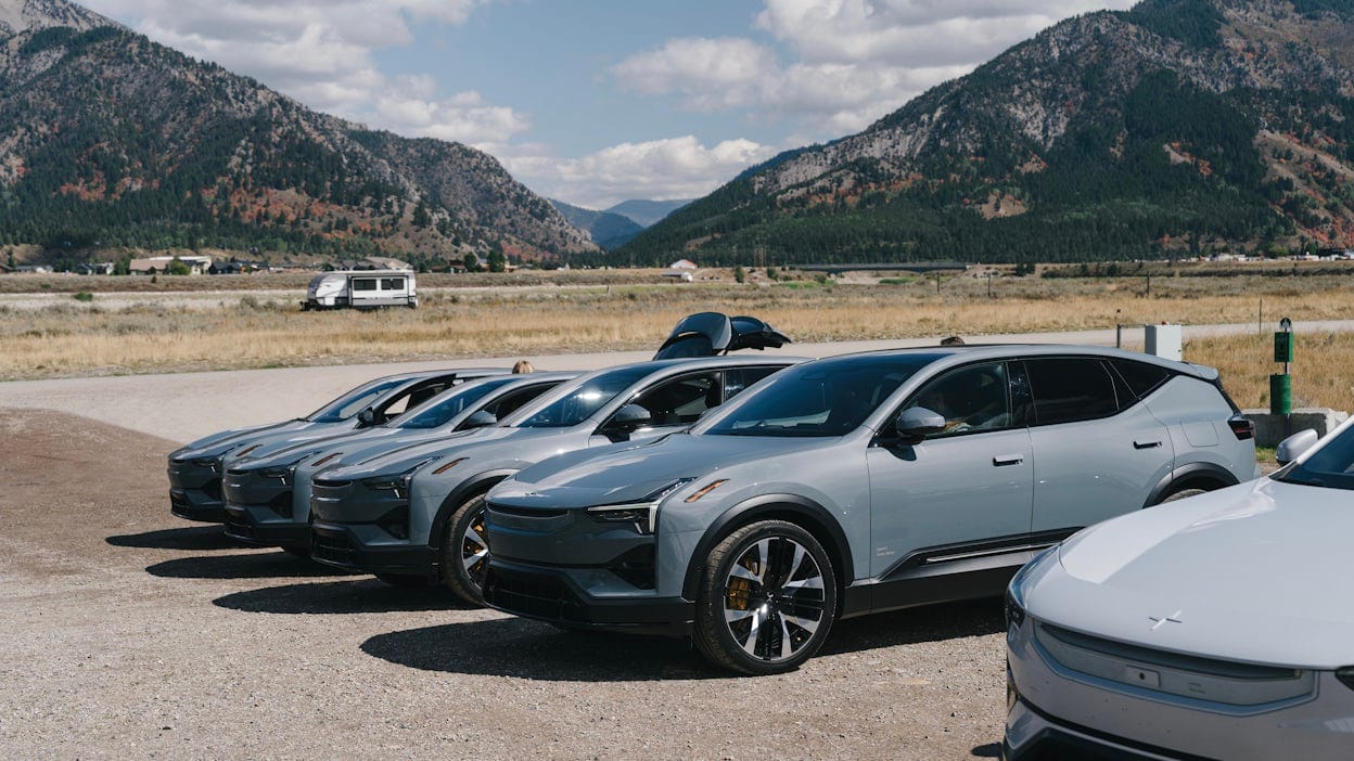 Polestar 3's lined-up in front of the mountains in Wyoming.