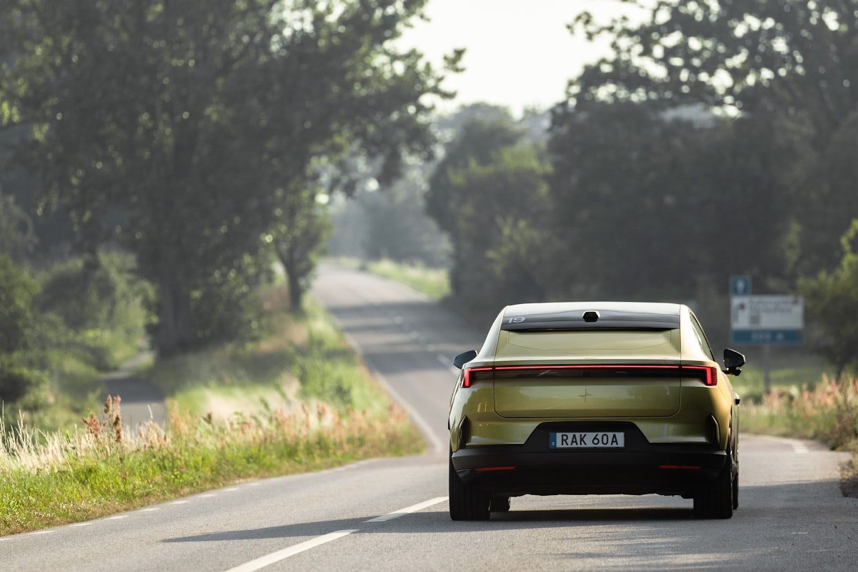 Polestar 4 driving down country road