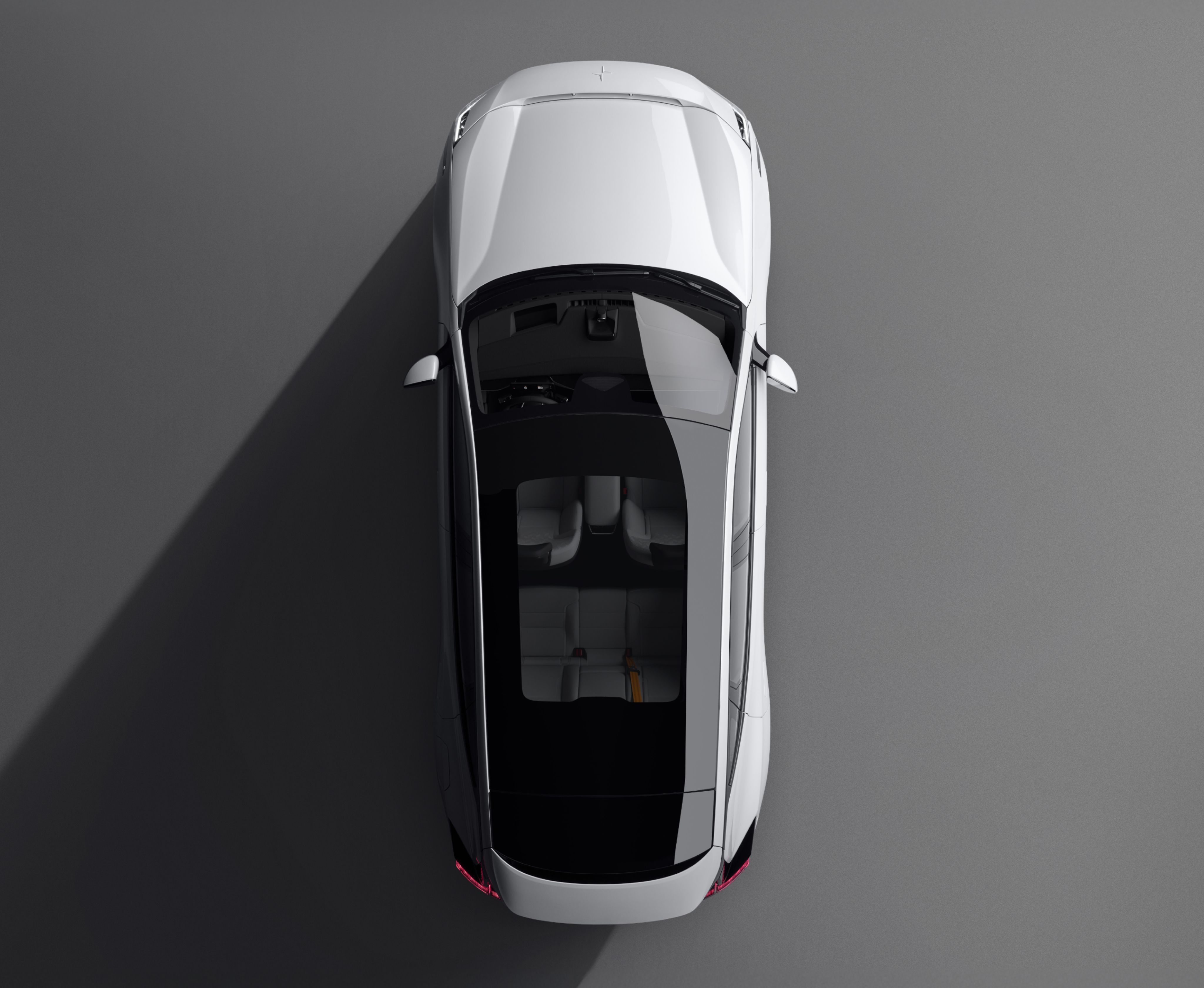 Polestar 3 seen from above on grey floor.