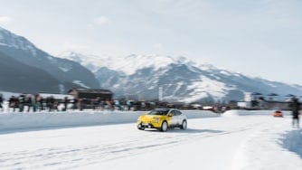 Polestar 4 racing around ice track in Alps